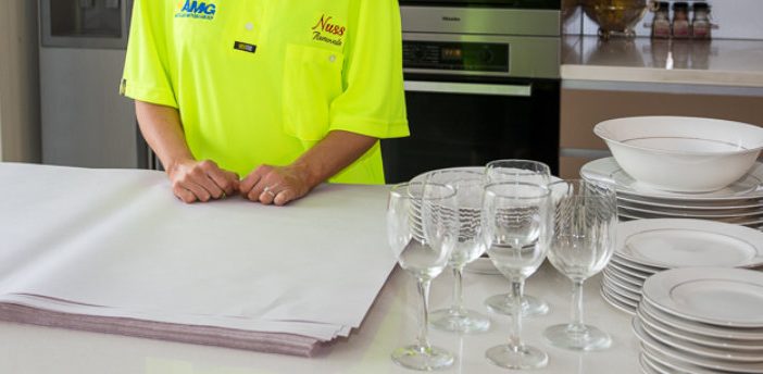 Removalist wrapping kitchen ware with packaging materials